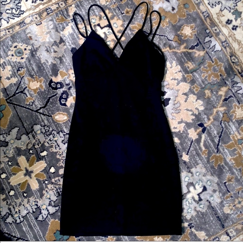 Black cocktail dress with cross straps